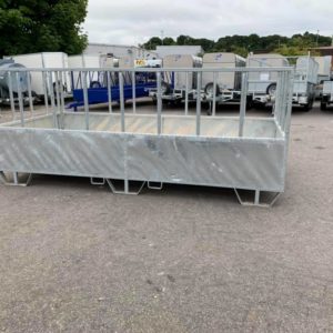 For Sale . 12 ft galvanized feed box . With removable swing open gate . Easily moved with fork pockets for lifting . Wood slated floor .Call mark on 07710637078 or Allan Grant 07743 199174.
