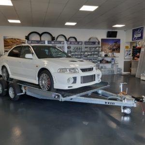 New Ifor Williams CT157 Car Transporta Trailer 2600kg Unladen Weight 600kg, bed size 4.6m long x 2.6m wide for wider & longer vehicles, Grip flooring as standard,  Can be loaded when unhitched from vehicle, stowable ramps , center deck & toolbox, new style LED lights & spare wheel , more details call Mark on 07710 637078 or Sales on 01463 248268, Mitsubishi Evo not included but for sale Speak to Mark